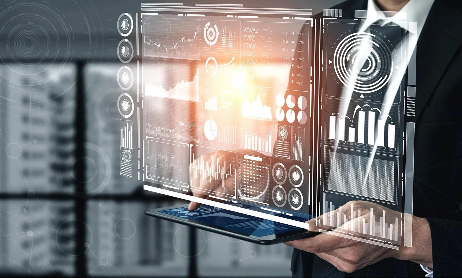 Persona con una tableta ante gráficos holográficos de datos e inteligencia artificial