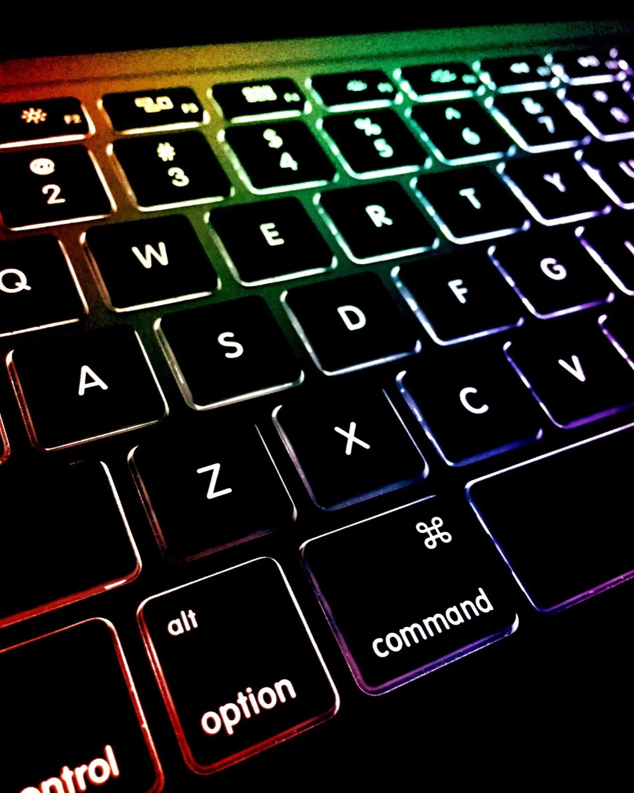 Teclado de portátil retroiluminado con luces de colores
